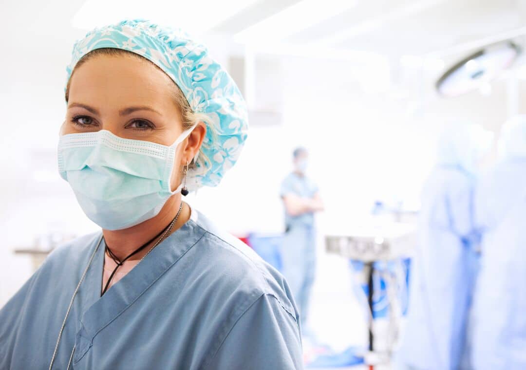 A healthcare provider in an operating room.
